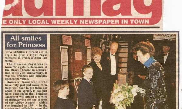 A newspaper clipping showing and image of Princess Anne greeting people