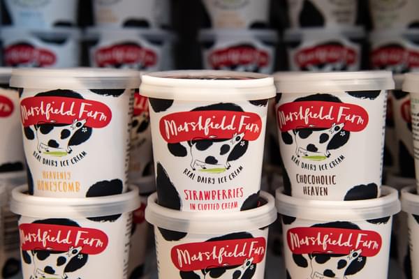 A shelf full of different flavours of Marshfield farm ice cream