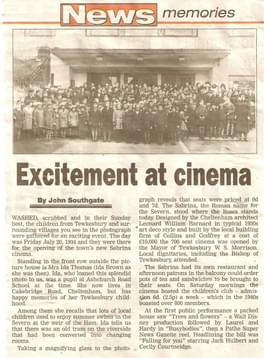 A newspaper clipping showing a large group of people outside the Sabrina cinema