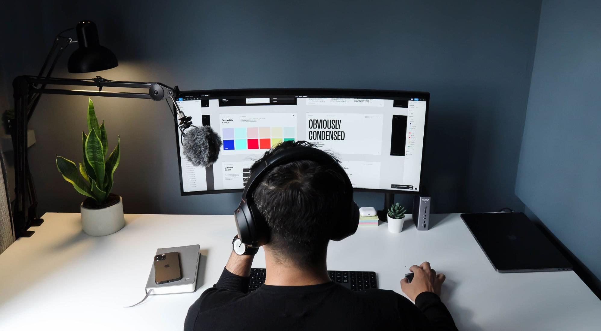 Designer at computer working on an UI Kit