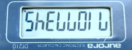 Calculator spelling the word Shell Oil