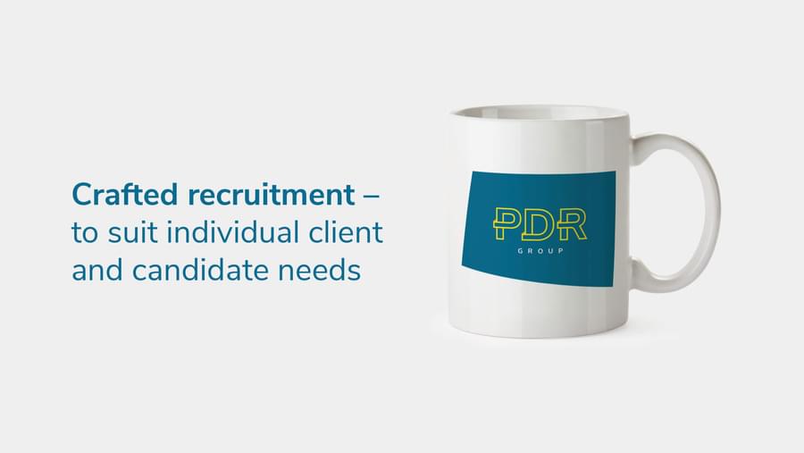 PDR Solutions logo on a mug with some advertorial text on the left.