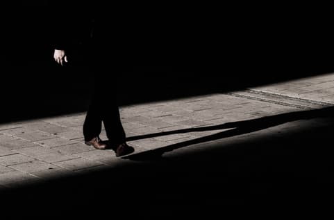 Dark picture of man walking