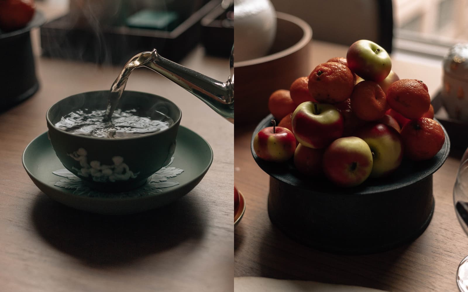 Tea being poured and a stand filled with apples and oranges.