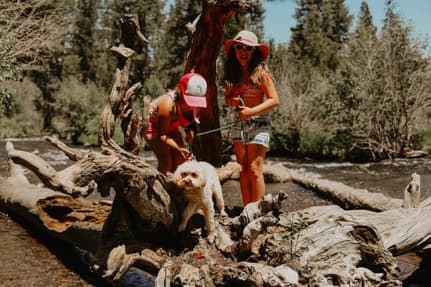 My two daughters and our dog, Maggie, hanging out at the river
