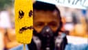 Maiskolben mit wütendem Gesicht bei einer Gentechnik-Demo