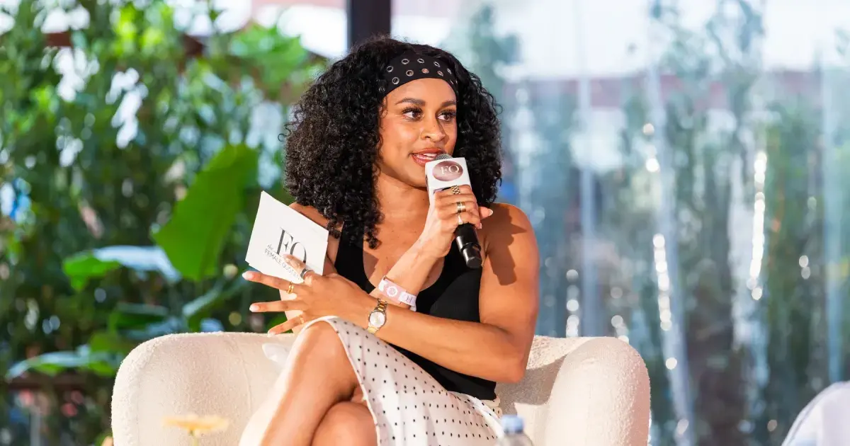Imani Ellis moderates the From Moments to Movements panel at FQ Beach