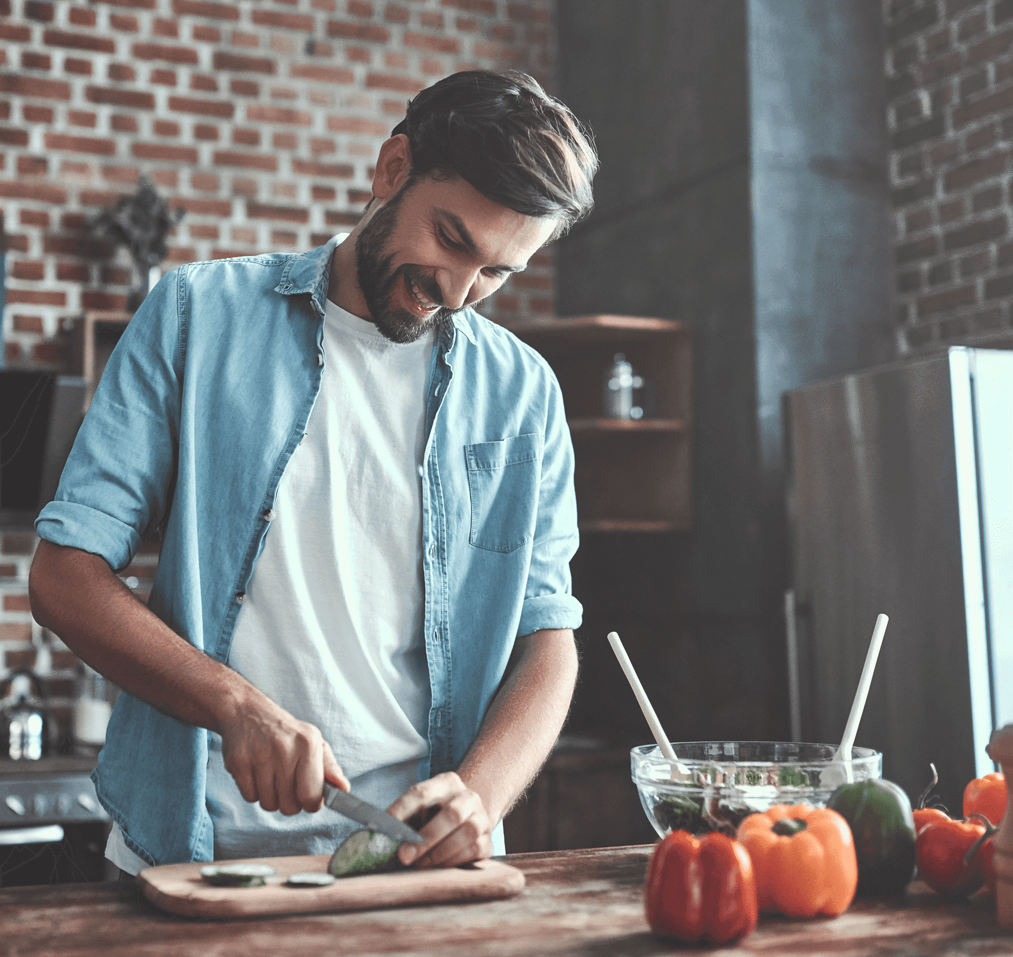 Man chopping vegetables