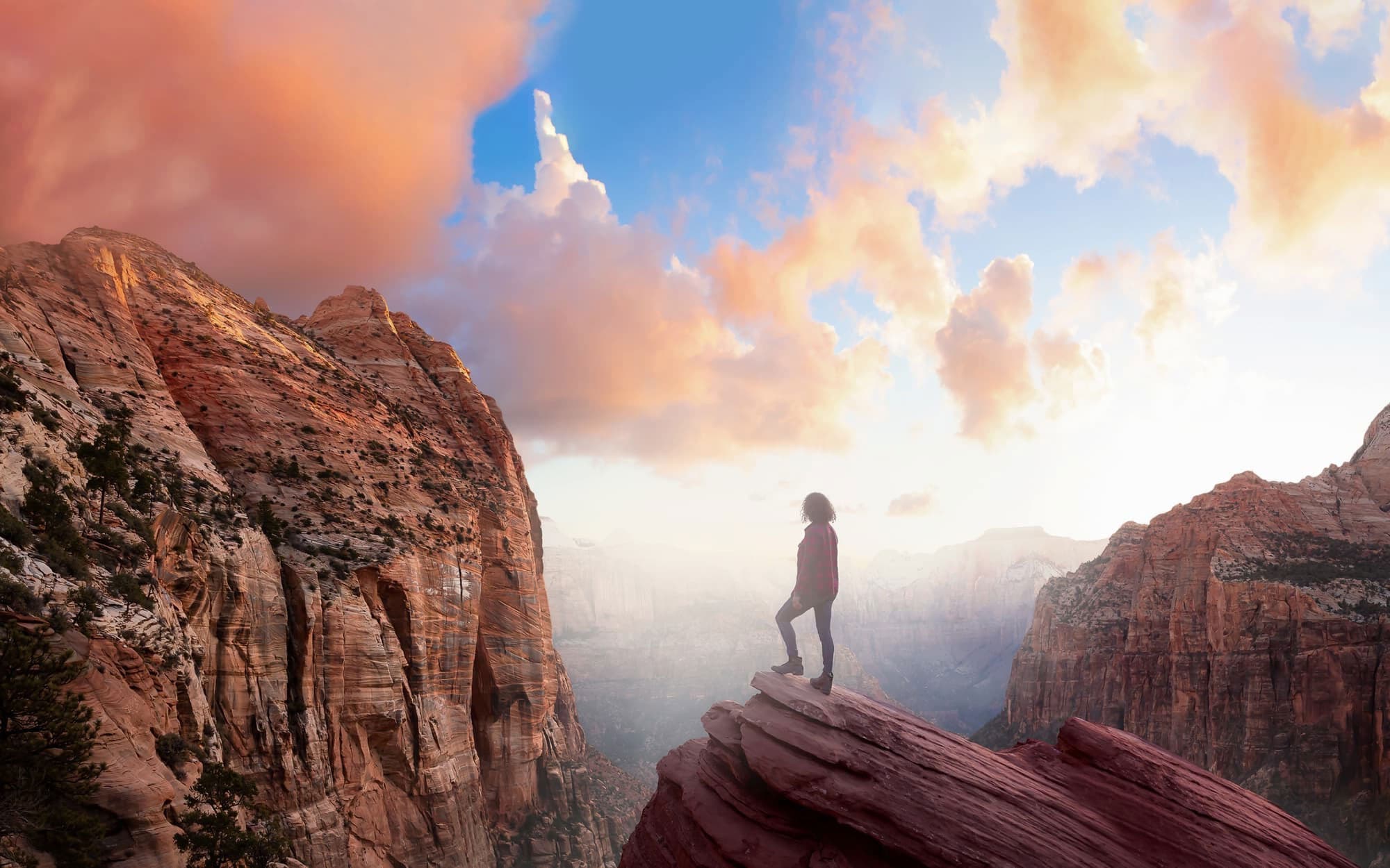 Woman Looking Up At Mountain