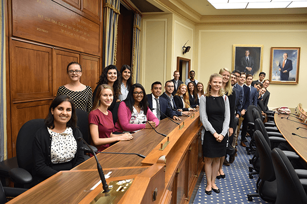 Students at their internship in the Global and Federal Fellows Program