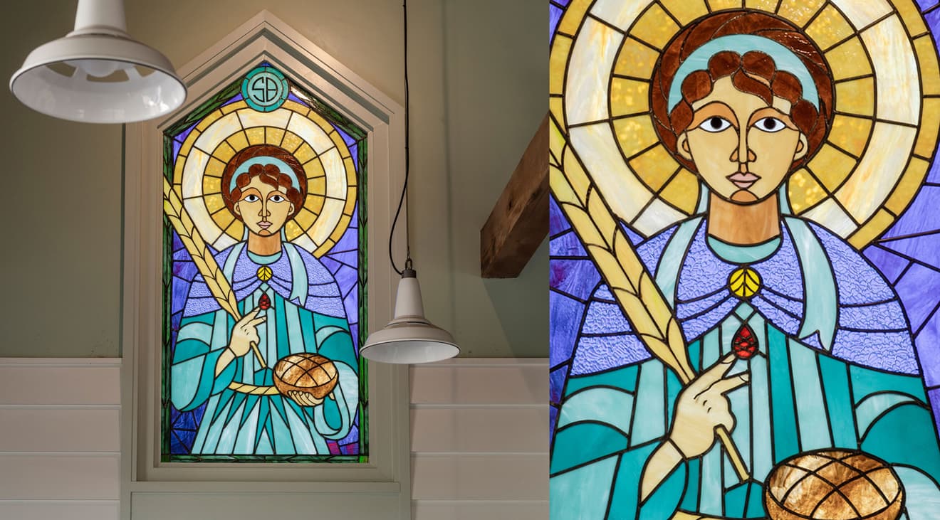 A close-up look at the Saint Bread stained glass window.