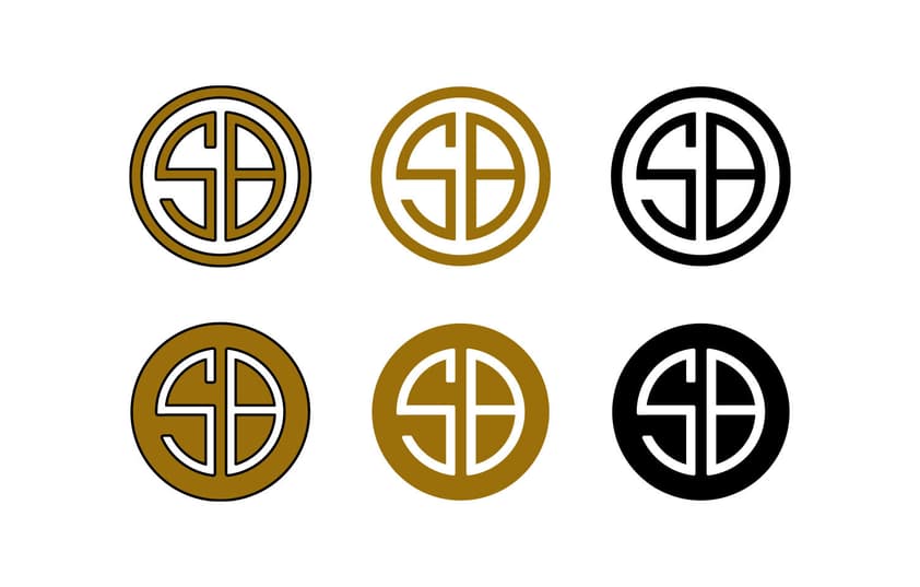 A group of different colored Saint Bread badges.