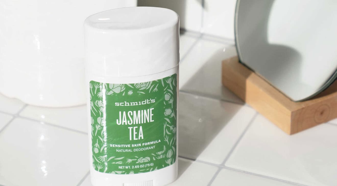 Jasmine tea scented deodorant on a bathroom counter.