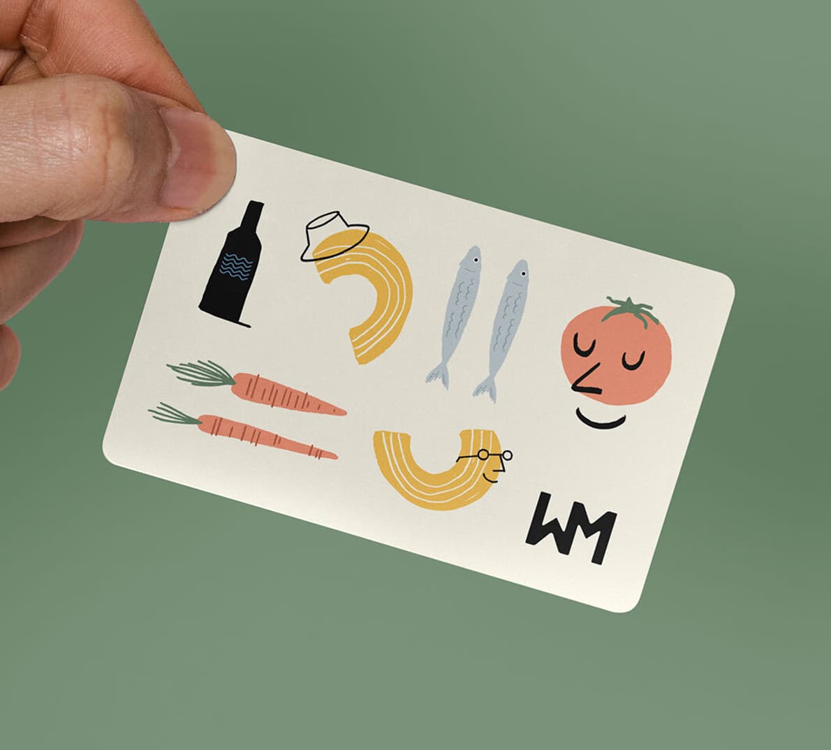 A hand holding a Wellspent Market gift card in front of a green background. 