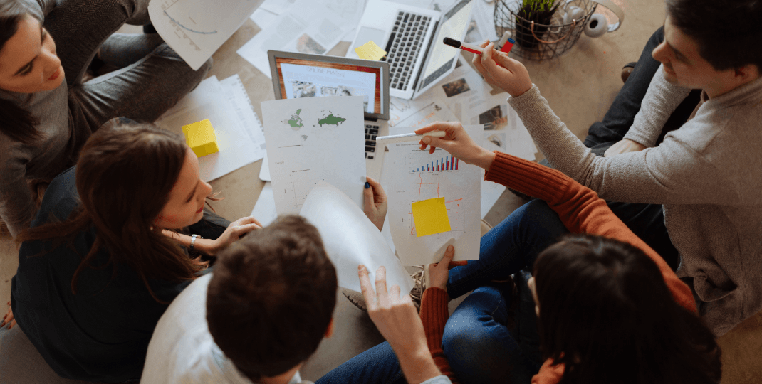 People in an office looking at documents