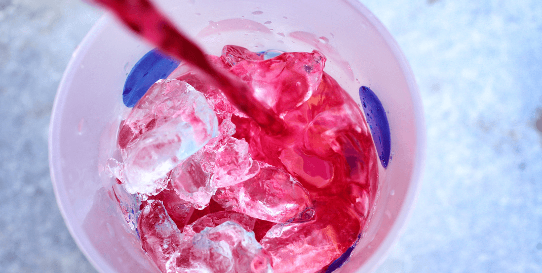 red beverage with ice
