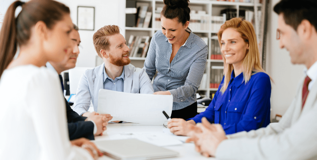 people discussing in office