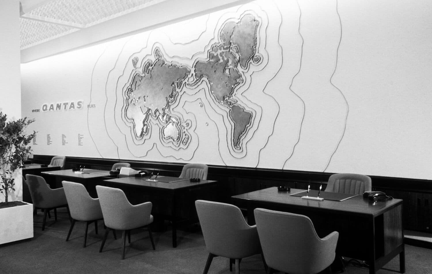 Large map detail in Qantas lounge with dining area below