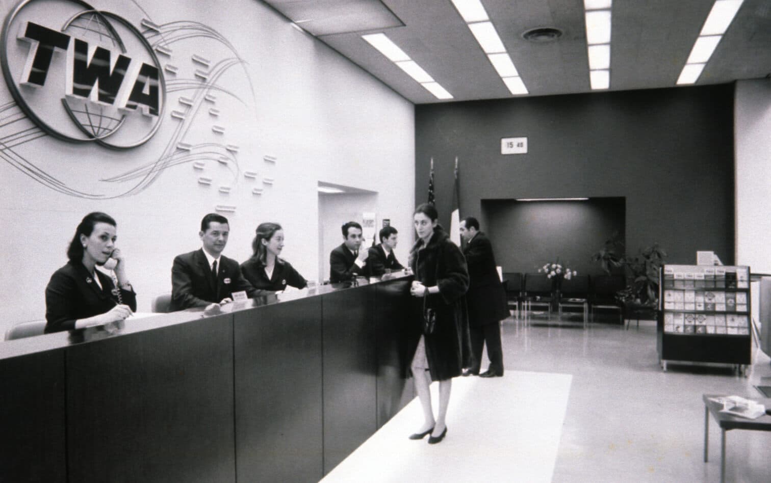 Passengers checking in for a flight at the TWA counter