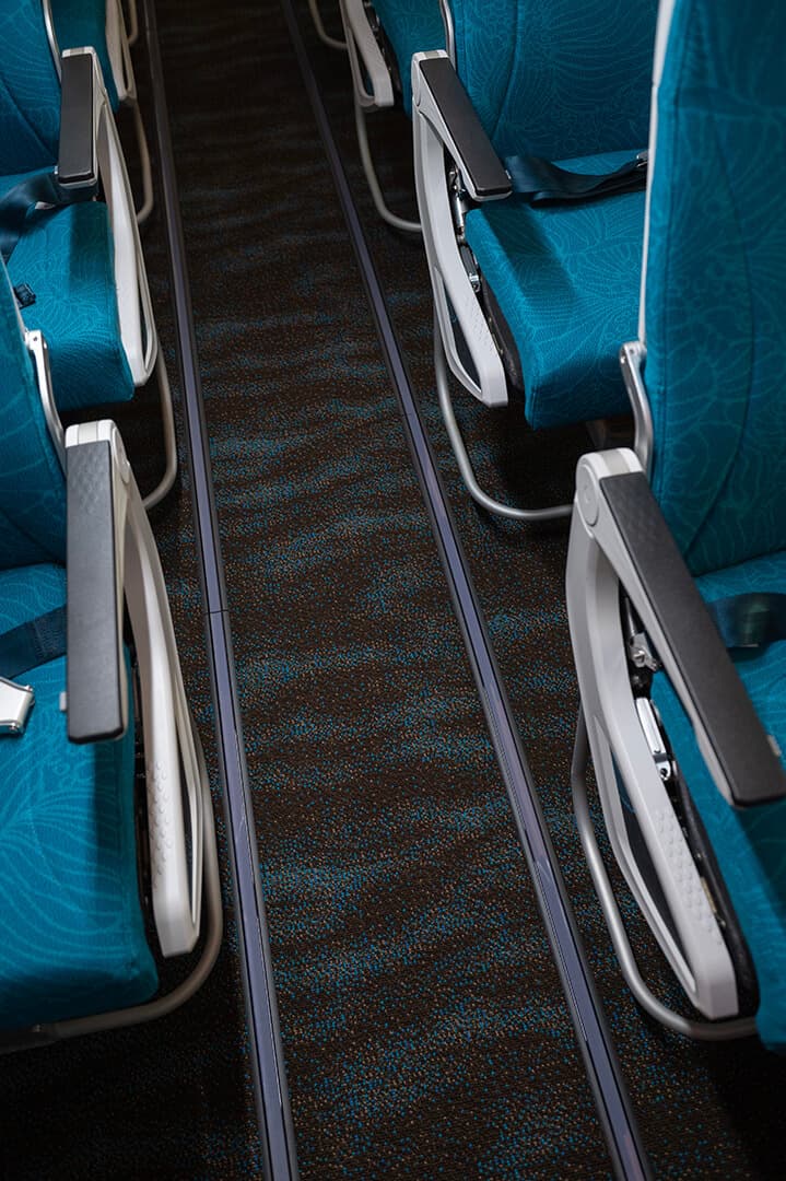 Hawaiian Airlines 787 carpet featuring blue tone waves on a deep blue background