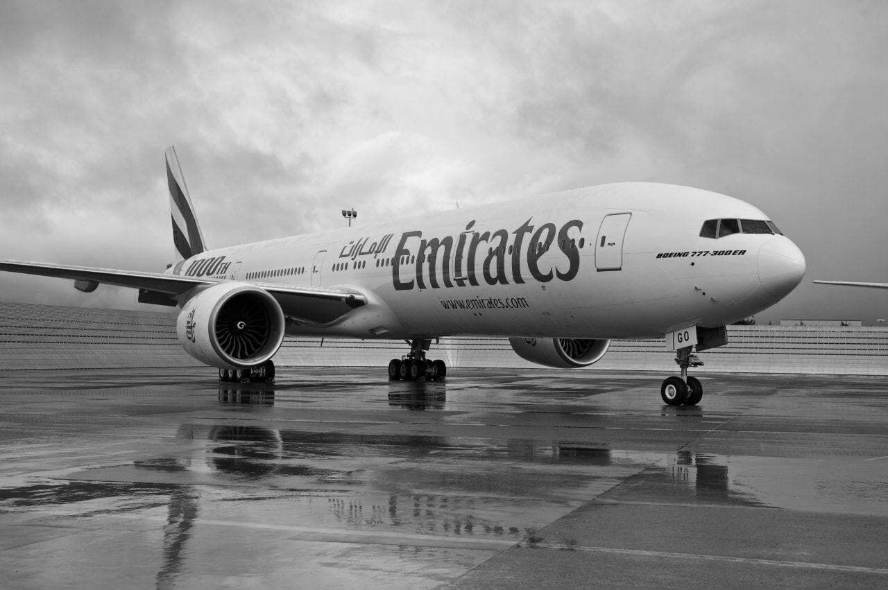 Emirates 777-300ER parked on tarmac