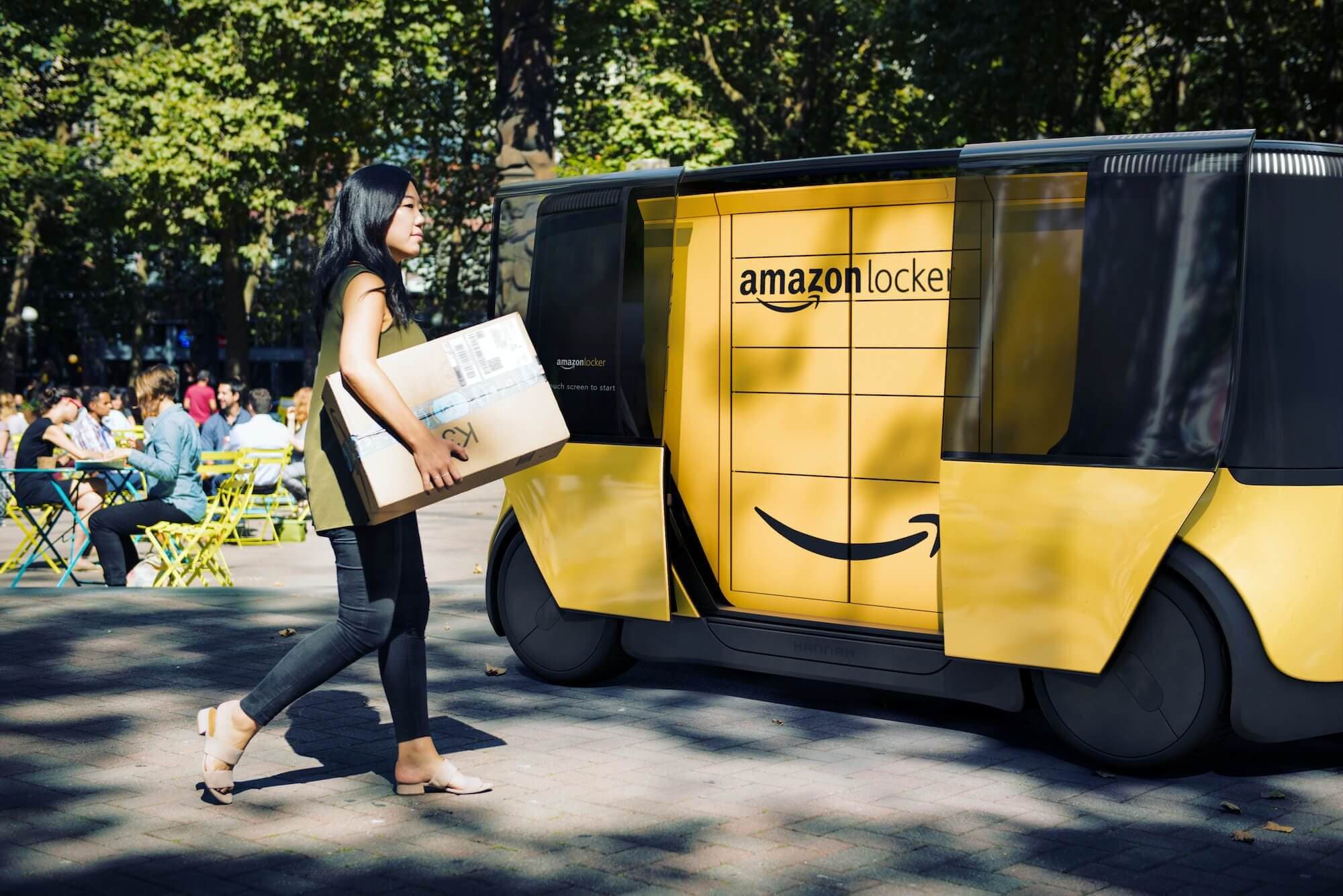 Women holding a package walking up to Hannah with Amazon locker insert