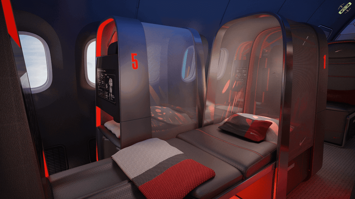 Lay flay seat in airplane with blue dynamic lighthing
