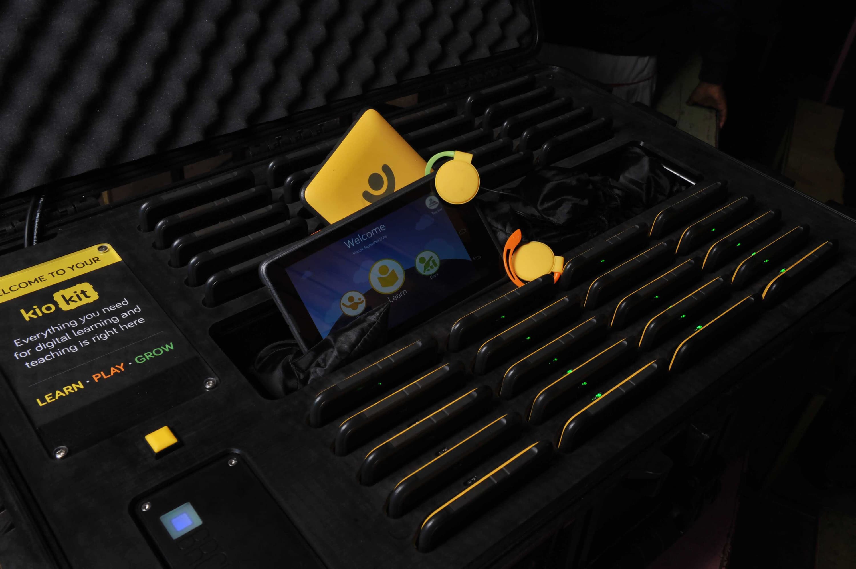 Kio kit tablets cradled in charging case