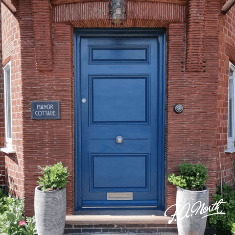 Blue timber door manor house