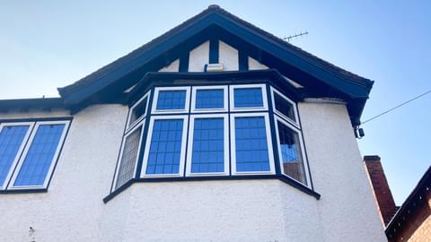 First floor timber leaded bay window