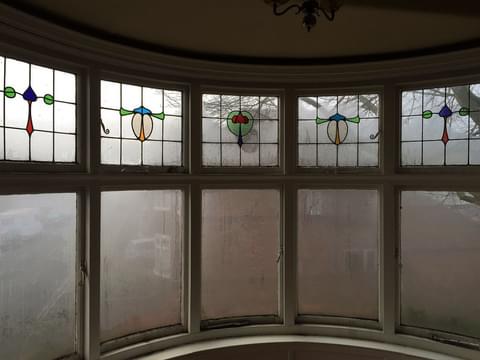 Curved bay window misted before