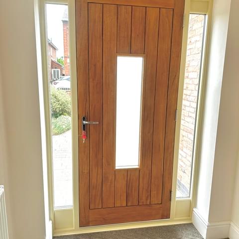 Secure Timber Door With Glazed Side Panels Internal View