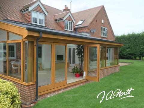 Timber french doors and conservatory