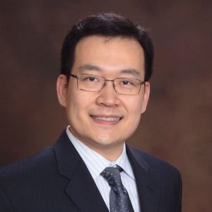 Headshot of John X.J. Zhang