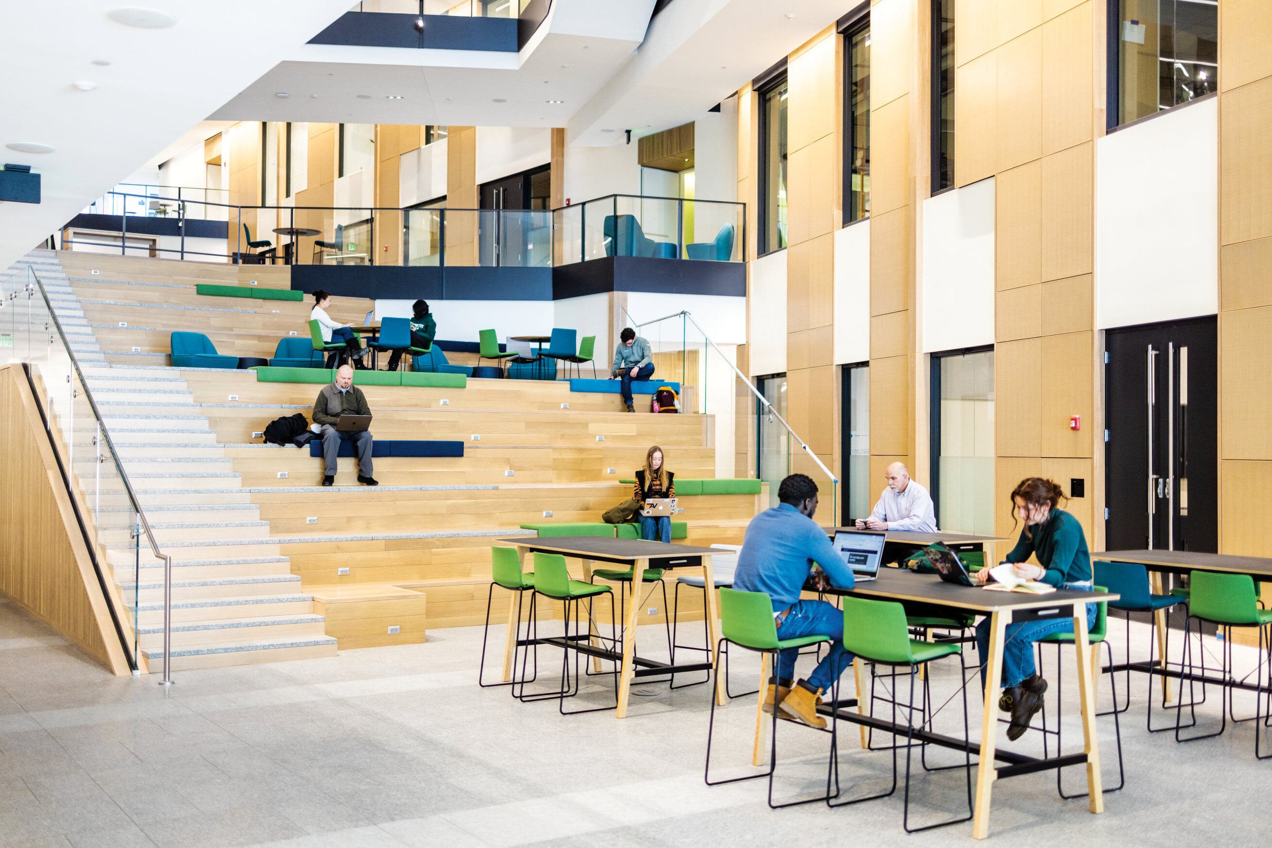 ECSC atrium with students sitting at tables