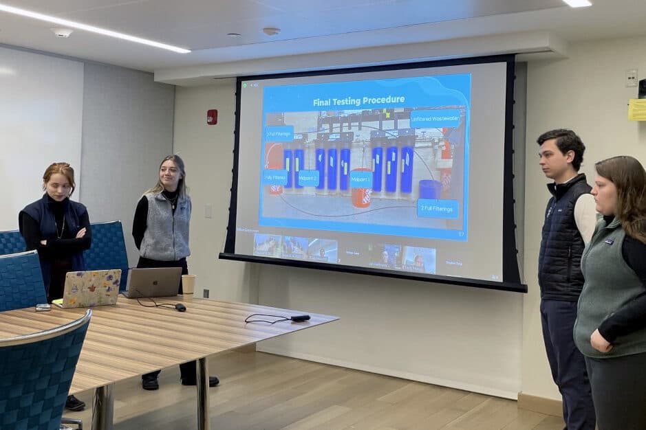 Student team members, Ariana Arvelo '23; Abbi Fitzpatrick '22 Th'23; Billy Gano '22 Th'23; Eliana Ray '23 Th'23 present their project on a Low Cost, Open Source Wastewater PFAS Removal System