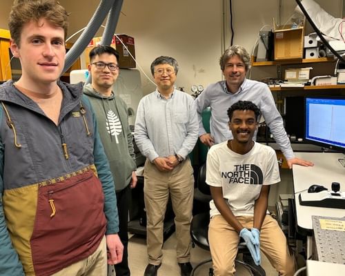 Dartmouth co-authors pose for a photo in the materials testing lab.