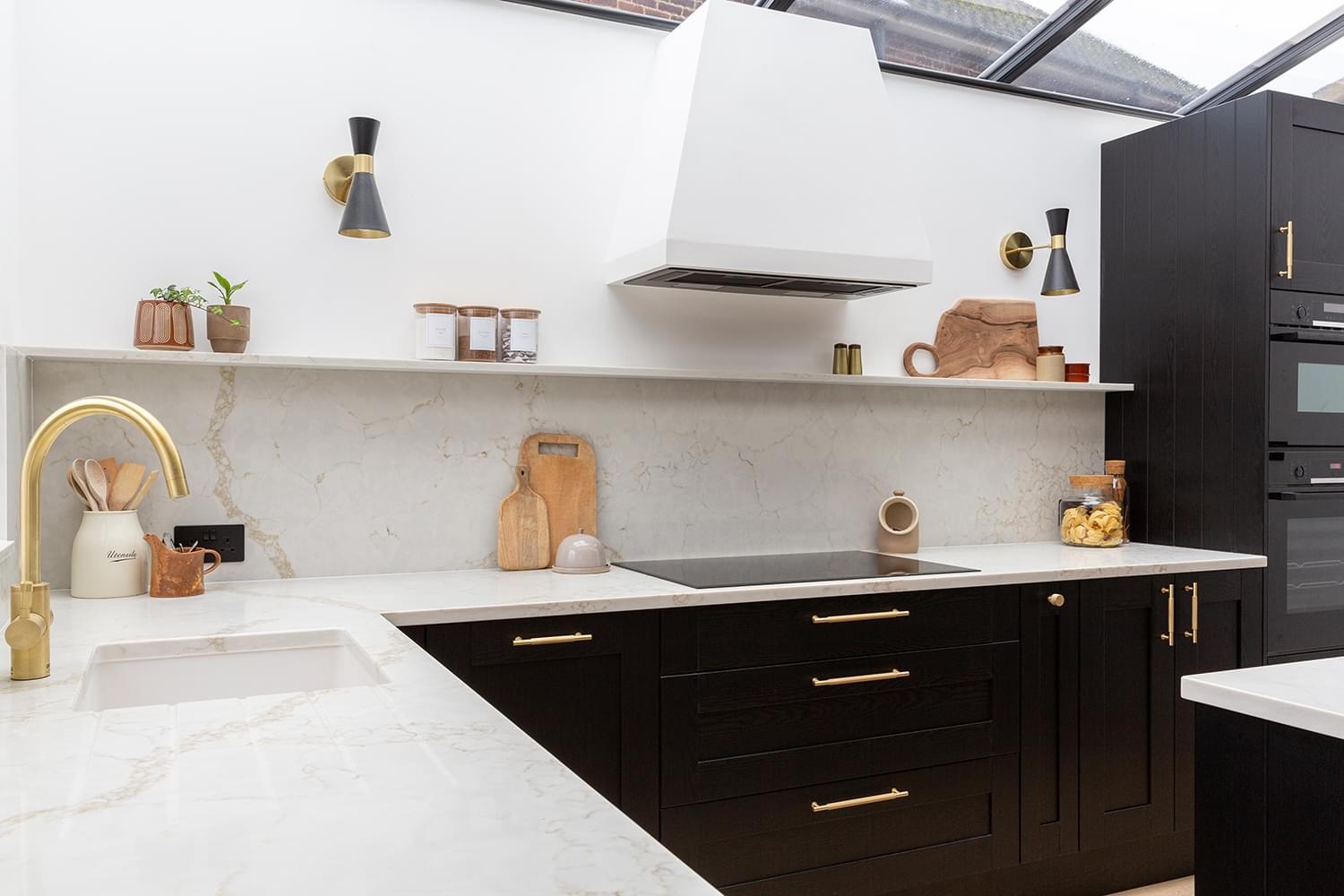 Marble effect worktops with black cabinetry