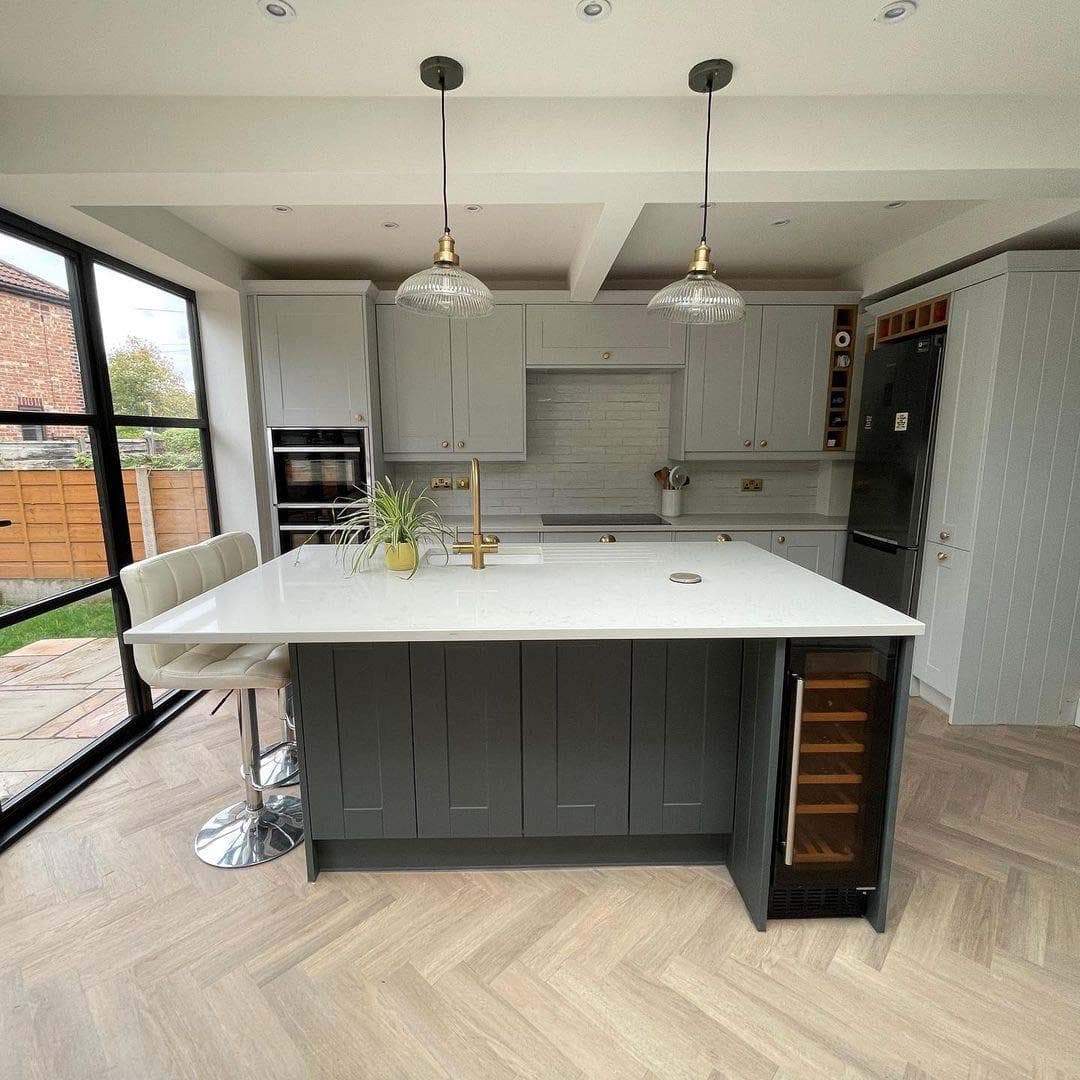 Shaker style kitchen with marble effect quartz worktops