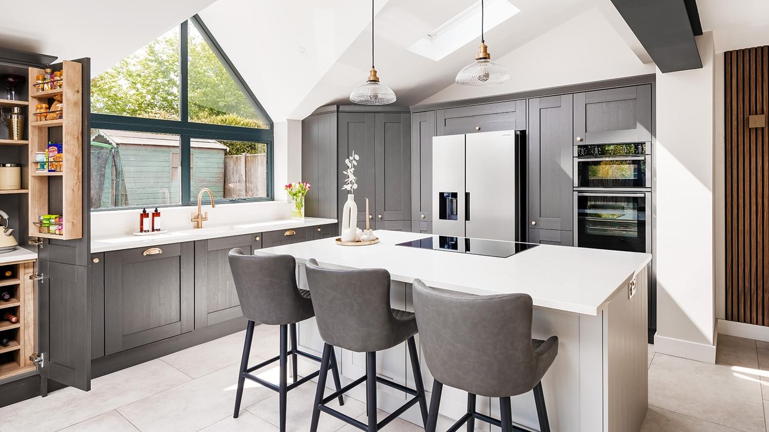 Two tone kitchen with white quartz countertops