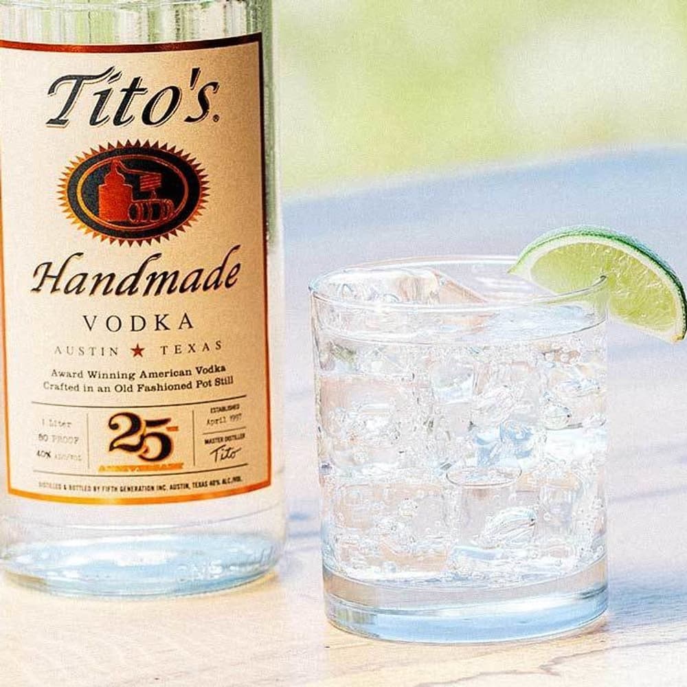 Tito's Soda Lime with Tito's 25th anniversary bottle