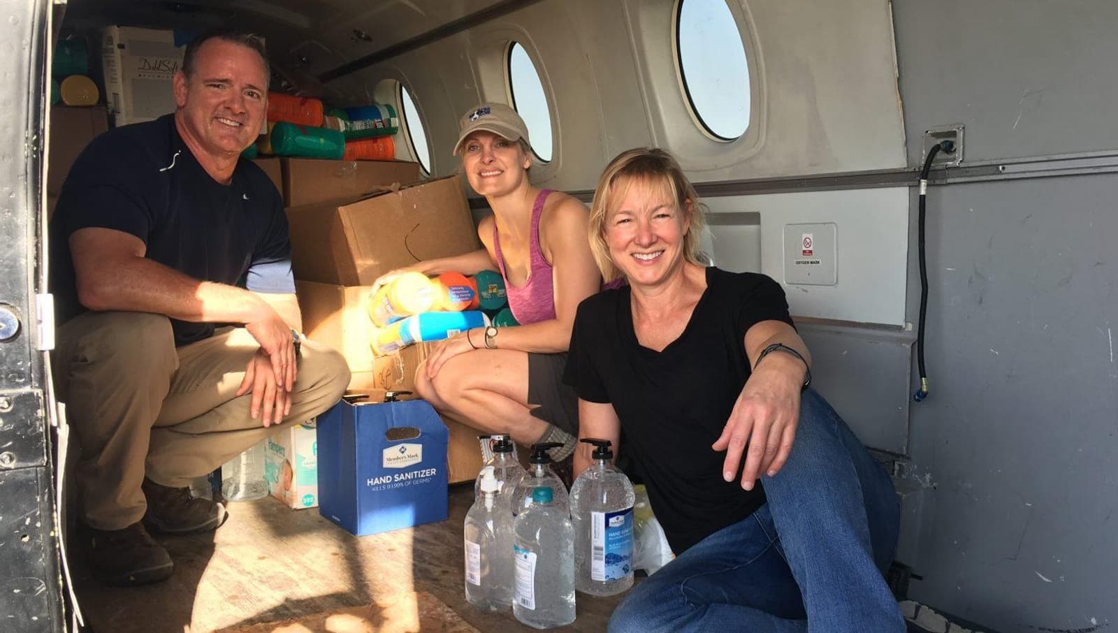 Tito's Vodka One Good Turn Founder and Volunteers Sitting