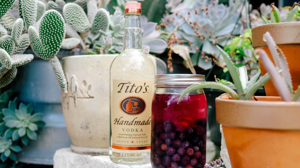 Tito's Vodka Blueberry infusion in a mason jar