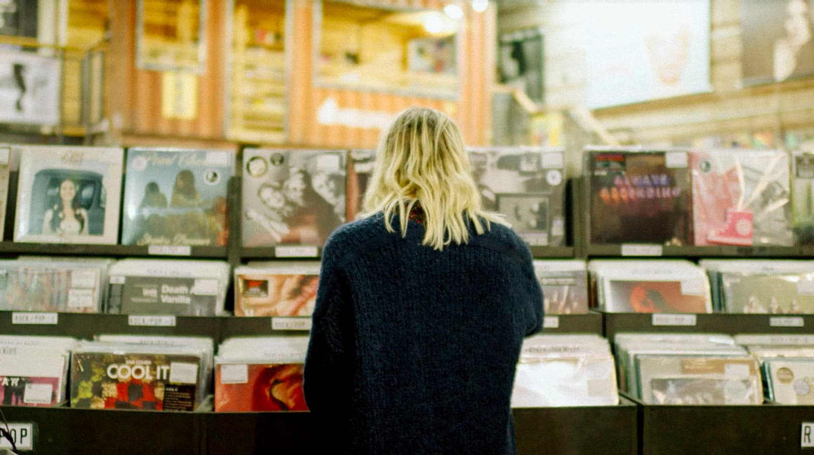 Person Shifting Through Records on Record Store Day