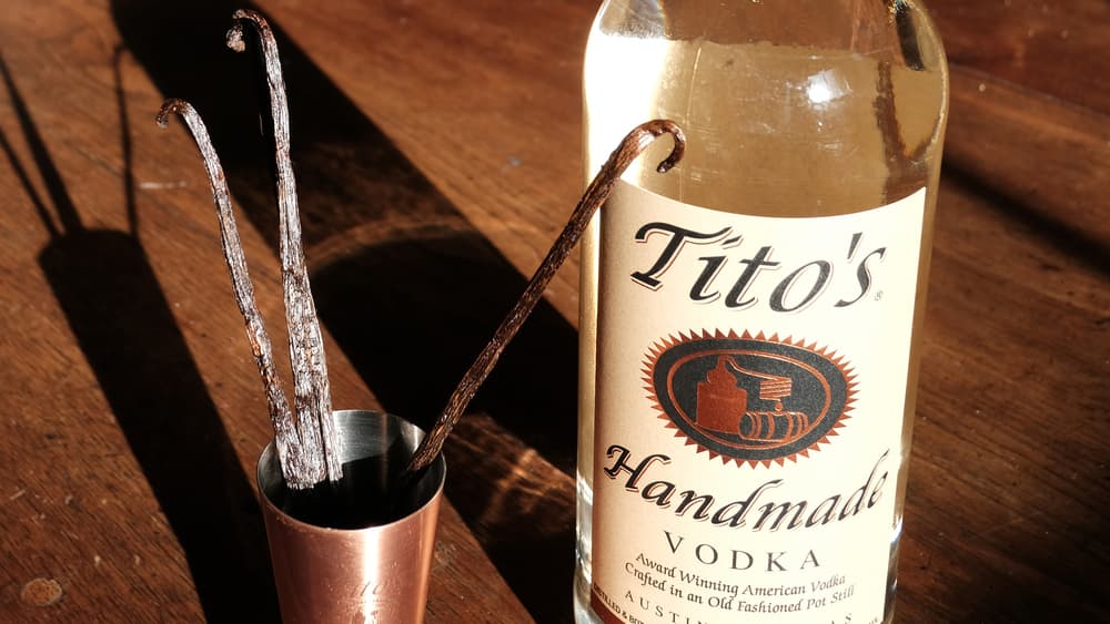 Tito's Handmade Vodka bottle and vanilla beans
