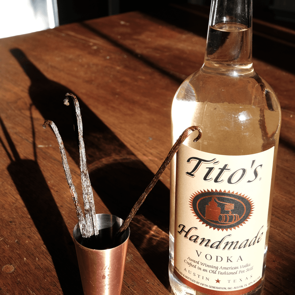 Tito's Handmade Vodka bottle and vanilla beans