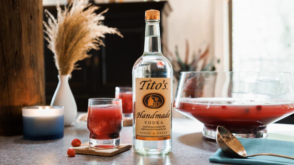 Tito's Berry Good Punch and a Tito's Handmade Vodka bottle