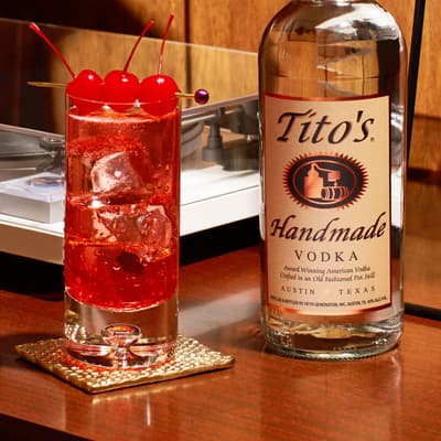 Tito's Dirty Shirley and a Tito's Handmade Vodka bottle
