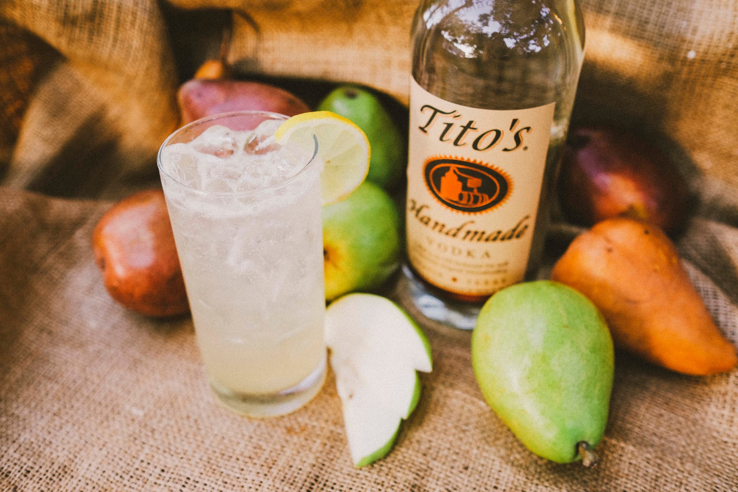Tito's Vodka pear cocktail with lemon slice