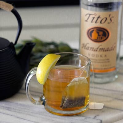 Tito's Toddy garnished with a lemon wedge